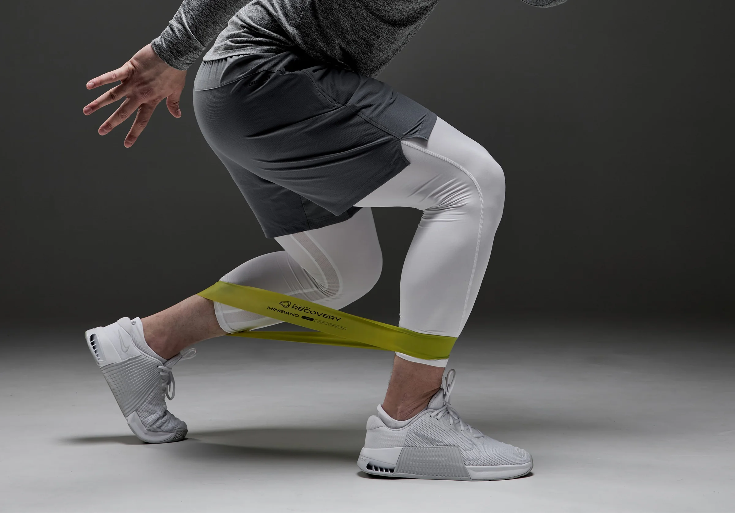 Image of person squatting with a barbell